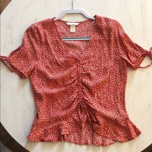 Red floral print with ruche gathering center